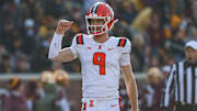 Nov 4, 2023; Minneapolis, Minnesota, USA; Illinois Fighting Illini quarterback Luke Altmyer (9) celebrates his touchdown pass to wide receiver Isaiah Williams (1) during the first half against the Minnesota Golden Gophers at Huntington Bank Stadium. Mandatory Credit: Matt Krohn-USA TODAY Sports