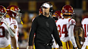 Oct 5, 2024; Minneapolis, Minnesota, USA; USC Trojans head coach Lincoln Riley looks on during the first half against the Minnesota Golden Gophers at Huntington Bank Stadium. Mandatory Credit: Matt Krohn-Imagn Images