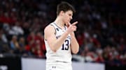 Mar 15, 2024; Minneapolis, MN, USA; Northwestern Wildcats guard Brooks Barnhizer (13) celebrates his basket against the Wisconsin Badgers during the first half at Target Center. Mandatory Credit: Matt Krohn-Imagn Images
