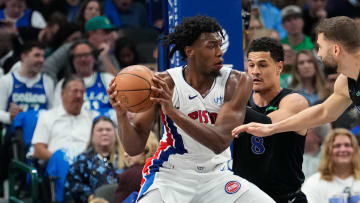 Apr 12, 2024; Dallas, Texas, USA; Detroit Pistons center James Wiseman (13) looks to score against Dallas Mavericks guard Josh Green (8) during the first half at American Airlines Center. Mandatory Credit: Chris Jones-USA TODAY Sports