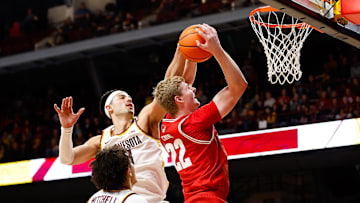 Jan 23, 2024; Minneapolis, Minnesota, USA; Minnesota Golden Gophers forward Dawson Garcia (3) blocks a shot by Wisconsin Badgers forward Steven Crowl (22) during the second half at Williams Arena. Mandatory Credit: Matt Krohn-Imagn Images