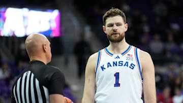 Jan 22, 2025; Fort Worth, Texas, USA;  Kansas Jayhawks center Hunter Dickinson (1) reacts against the TCU Horned Frogs during the second half at Ed and Rae Schollmaier Arena.