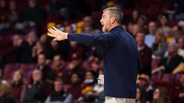 Nov 6, 2024; Minneapolis, Minnesota, USA; Oral Roberts Golden Eagles head coach Russell Springmann calls a play during the first half against the Minnesota Golden Gophers at Williams Arena. Mandatory Credit: Matt Krohn-Imagn Images