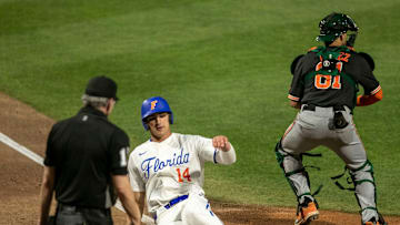 Florida's utility Jac Caglianone (14) scores a run against the Miami Hurricanes, Friday, March 3, 2023, at Condron Family Baseball Park in Gainesville, Florida. The Gators beat the Hurricanes 10-4 in Game 1. [Cyndi Chambers/ Gainesville Sun] 2023

Gator Baseball March 3 2023 Condron Family Ballpark Miami Hurricanes