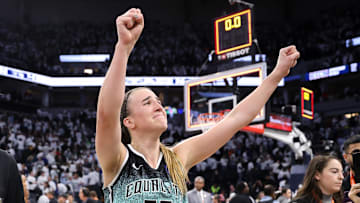 Oct 16, 2024; Minneapolis, Minnesota, USA; New York Liberty guard Sabrina Ionescu (20) celebrates her teams win after game three of the 2024 NBA Finals against the Minnesota Lynx at Target Center. Mandatory Credit: Matt Krohn-Imagn Images