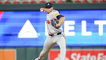 Aug 28, 2024; Minneapolis, Minnesota, USA; Atlanta Braves pitcher Joe Jimenez (77) delivers a pitch against the Minnesota Twins during the eighth inning at Target Field. Mandatory Credit: Matt Krohn-Imagn Images