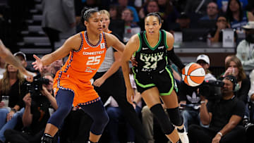 Sep 29, 2024; Minneapolis, Minnesota, USA; Minnesota Lynx forward Napheesa Collier (24) works around Connecticut Sun forward Alyssa Thomas (25) during the first half of game one of the 2024 WNBA Semi-finals at Target Center. Mandatory Credit: Matt Krohn-Imagn Images