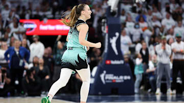 Oct 16, 2024; Minneapolis, Minnesota, USA; New York Liberty guard Sabrina Ionescu (20) celebrates her 3-point basket against the Minnesota Lynx during the second half of game three of the 2024 WNBA Finals at Target Center. Mandatory Credit: Matt Krohn-Imagn Images