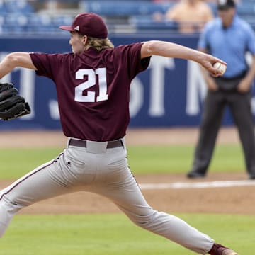 May 23, 2024; Hoover, AL, USA; Texas A&M Aggies pitcher Weston Moss (21) pitches against the Tennessee Volunteers during the SEC Baseball Tournament at Hoover Metropolitan Stadium. Mandatory Credit: Vasha Hunt-Imagn Images