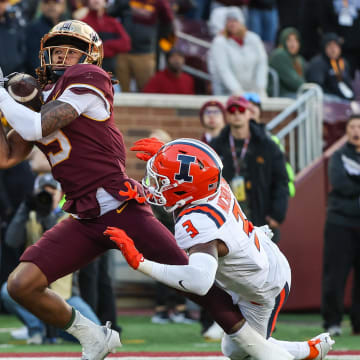 Minnesota wide receiver Daniel Jackson (9) makes a touchdown catch while Illinois defensive back Tahveon Nicholson (3) defends during the second half at Huntington Bank Stadium in Minneapolis on Nov. 4, 2023.