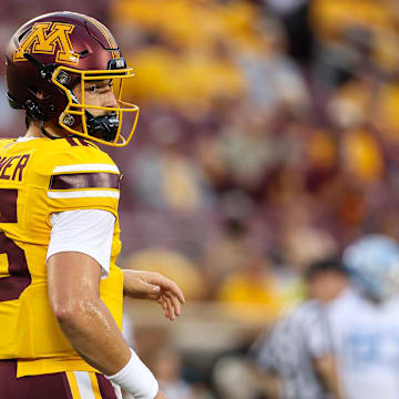 Aug 29, 2024; Minneapolis, Minnesota, USA; Minnesota Golden Gophers quarterback Max Brosmer (16) warms up before the game against the North Carolina Tar Heels at Huntington Bank Stadium. Mandatory Credit: Matt Krohn-Imagn Images