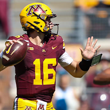 Sep 7, 2024; Minneapolis, Minnesota, USA; Minnesota Golden Gophers quarterback Max Brosmer (16) throws the ball against the Rhode Island Rams during the first half at Huntington Bank Stadium. Mandatory Credit: Matt Krohn-Imagn Images