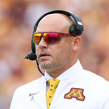 Sep 14, 2024; Minneapolis, Minnesota, USA; Minnesota Golden Gophers head coach P.J. Fleck looks on during the first half against the Nevada Wolf Pack at Huntington Bank Stadium. Mandatory Credit: Matt Krohn-Imagn Images