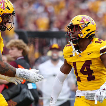 Sep 14, 2024; Minneapolis, Minnesota, USA; Minnesota Golden Gophers defensive back Kerry Brown (14) celebrates his interception against the Nevada Wolf Pack during the first half at Huntington Bank Stadium. Mandatory Credit: Matt Krohn-Imagn Images