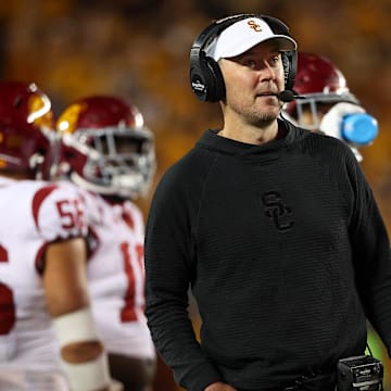 Oct 5, 2024; Minneapolis, Minnesota, USA; USC Trojans head coach Lincoln Riley looks on during the second half against the Minnesota Golden Gophers at Huntington Bank Stadium. Mandatory Credit: Matt Krohn-Imagn Images