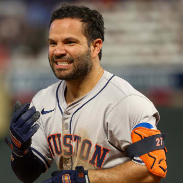 Jul 5, 2024; Minneapolis, Minnesota, USA; Houston Astros second baseman Jose Altuve (27) reacts after getting hit by a pitch during the eighth inning against the Minnesota Twins at Target Field.