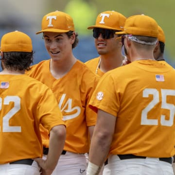 May 23, 2024; Hoover, AL, USA; Tennessee Volunteers pitcher Chris Stamos (27) talks with head coach Tony Vitello (22) during a game against the Texas A&M Aggies at the SEC Baseball Tournament at Hoover Metropolitan Stadium.