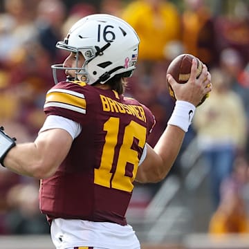 Oct 26, 2024; Minneapolis, Minnesota, USA; Minnesota Golden Gophers quarterback Max Brosmer (16) throws the ball against the Maryland Terrapins during the first half at Huntington Bank Stadium. Mandatory Credit: Matt Krohn-Imagn Images