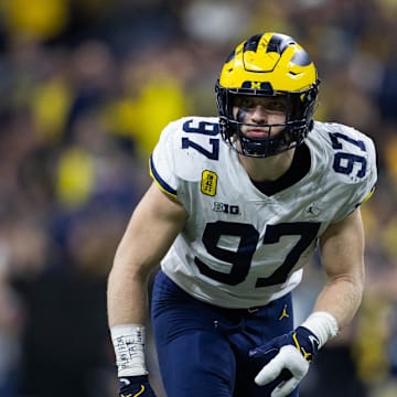 Dec 4, 2021; Indianapolis, IN, USA; Michigan Wolverines defensive end Aidan Hutchinson (97) in the second quarter against the Iowa Hawkeyes at Lucas Oil Stadium. Mandatory Credit: Trevor Ruszkowski-Imagn Images