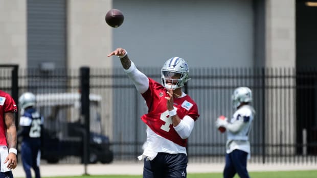   Dallas Cowboys quarterback Dak Prescott (4) goes through a drill during practice at the Ford Center