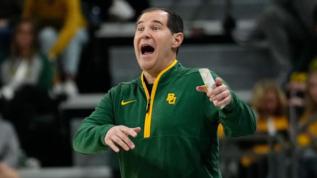 Baylor Bears head coach Scott Drew reacts against the Arlington Baptist Patriots Patriots during the first half of a game.