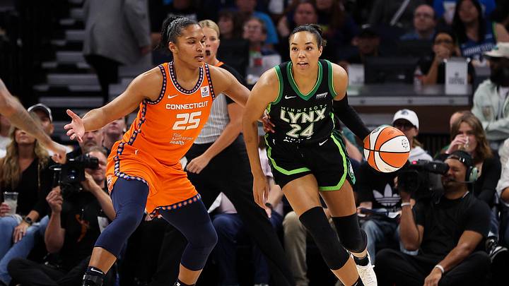 Sep 29, 2024; Minneapolis, Minnesota, USA; Minnesota Lynx forward Napheesa Collier (24) works around Connecticut Sun forward Alyssa Thomas (25) during the first half of game one of the 2024 WNBA Semi-finals at Target Center. Mandatory Credit: Matt Krohn-Imagn Images
