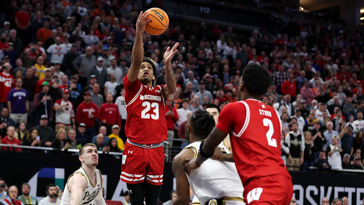 Mar 16, 2024; Minneapolis, MN, USA; Wisconsin Badgers guard Chucky Hepburn (23) shoots against the Purdue Boilermakers during the second half at Target Center. Mar 16, 2024; Minneapolis, MN, USA; Wisconsin Badgers guard Chucky Hepburn (23) shoots against the Purdue Boilermakers during the second half at Target Center.