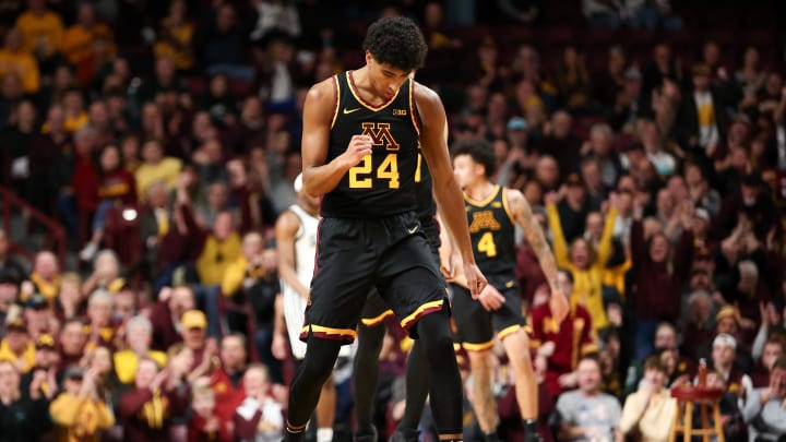 Feb 6, 2024; Minneapolis, Minnesota, USA; Minnesota Golden Gophers guard Cam Christie (24) celebrates after drawing a foul on his three-point shot against the Michigan State Spartans during the second half at Williams Arena. Mandatory Credit: Matt Krohn-USA TODAY Sports