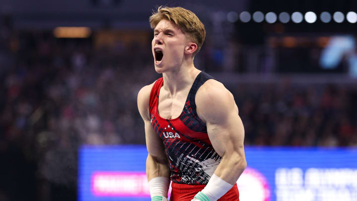 Shane Wiskus celebrates his rings routine during the U.S. Olympic Team Gymnastics Trials at Target Center in Minneapolis on June 29, 2024.