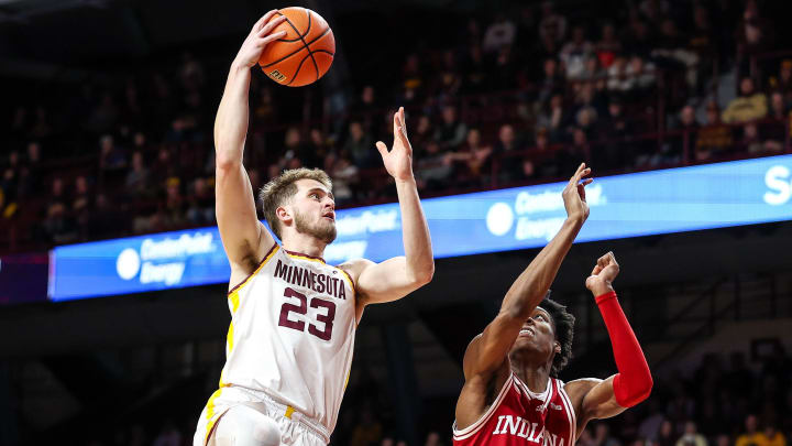 Mar 6, 2024; Minneapolis, Minnesota, USA; Minnesota Golden Gophers forward Parker Fox (23) shoots as Indiana Hoosiers forward Anthony Walker (4) defends during the first half at Williams Arena. Mandatory Credit: Matt Krohn-USA TODAY Sports