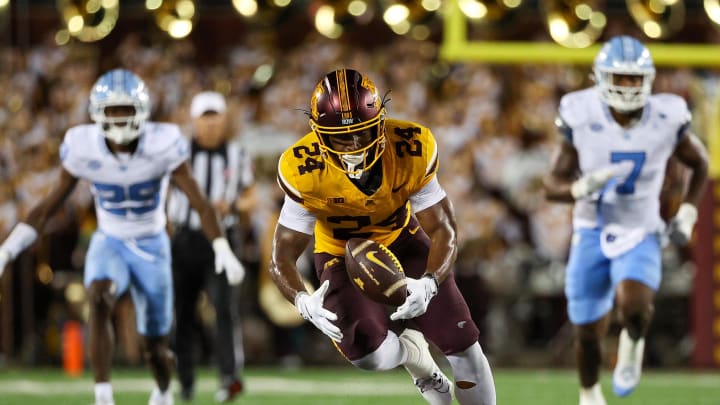 Aug 29, 2024; Minneapolis, Minnesota, USA; Minnesota Golden Gophers running back Marcus Major (24) fields a fumble against the North Carolina Tar Heels during the second half at Huntington Bank Stadium. Mandatory Credit: Matt Krohn-USA TODAY Sports