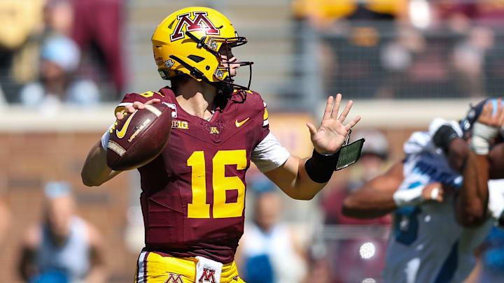 Sep 7, 2024; Minneapolis, Minnesota, USA; Minnesota Golden Gophers quarterback Max Brosmer (16) throws the ball against the Rhode Island Rams during the first half at Huntington Bank Stadium. Mandatory Credit: Matt Krohn-Imagn Images