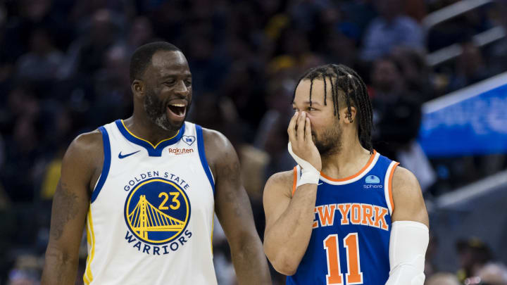 Mar 18, 2024; San Francisco, California, USA; Golden State Warriors center Draymond Green (23) and New York Knicks guard Jalen Brunson (11) share a laugh during the first half at Chase Center. Mandatory Credit: John Hefti-USA TODAY Sports