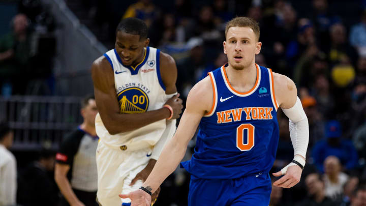 Mar 18, 2024; San Francisco, California, USA; New York Knicks guard Donte DiVincenzo (0) gestures after hitting a three-point shot against the Golden State Warriors  during the second half at Chase Center. Mandatory Credit: John Hefti-USA TODAY Sports