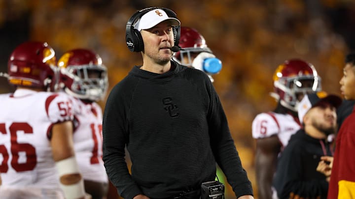 Oct 5, 2024; Minneapolis, Minnesota, USA; USC Trojans head coach Lincoln Riley looks on during the second half against the Minnesota Golden Gophers at Huntington Bank Stadium. Mandatory Credit: Matt Krohn-Imagn Images Oct 5, 2024; Minneapolis, Minnesota, USA; USC Trojans head coach Lincoln Riley looks on during the second half against the Minnesota Golden Gophers at Huntington Bank Stadium. Mandatory Credit: Matt Krohn-Imagn Images