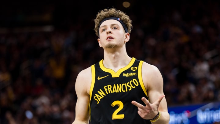 Feb 14, 2024; San Francisco, California, USA; Golden State Warriors guard Brandin Podziemski (2) reacts after hitting a three-point shot against the LA Clippers during the second half at Chase Center. Mandatory Credit: John Hefti-USA TODAY Sports