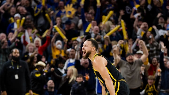 Feb 10, 2024; San Francisco, California, USA; Golden State Warriors guard Stephen Curry (30) reacts after hitting a three-ppont shot in the last second against the Phoenix Suns during the second half at Chase Center. Mandatory Credit: John Hefti-USA TODAY Sports