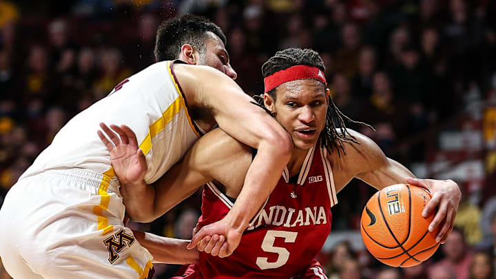 Indiana forward Malik Reneau (5) works around Minnesota forward Dawson Garcia (3) during the second half at Williams Arena. Indiana forward Malik Reneau (5) works around Minnesota forward Dawson Garcia (3) during the second half at Williams Arena.