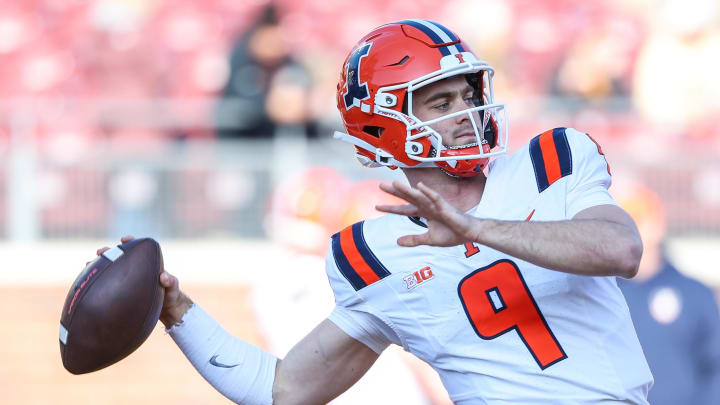 Nov 4, 2023; Minneapolis, Minnesota, USA; Illinois Fighting Illini quarterback Luke Altmyer (9) warms up before the game against the Minnesota Golden Gophers at Huntington Bank Stadium. Mandatory Credit: Matt Krohn-USA TODAY Sports