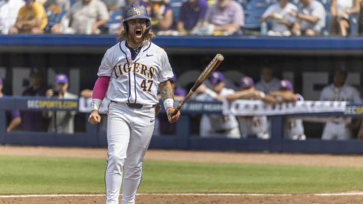 May 25, 2024; Hoover, AL, USA; LSU Tigers infielder Tommy White (47) reacts after a big swing against the South Carolina Gamecocks during the SEC Baseball Tournament at Hoover Metropolitan Stadium. Mandatory Credit: Vasha Hunt-USA TODAY Sports