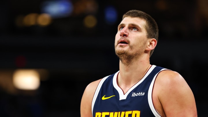 Nov 1, 2023; Minneapolis, Minnesota, USA; Denver Nuggets center Nikola Jokic (15) reacts during the second half against the Minnesota Timberwolves at Target Center. 