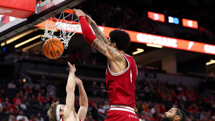 Mar 15, 2024; Minneapolis, MN, USA; Indiana Hoosiers center Kel'el Ware (1) dunks against Nebraska Cornhuskers guard Sam Hoiberg (1) during the second half at Target Center. Mandatory Credit: Matt Krohn-USA TODAY Sports