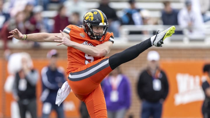 Feb 3, 2024; Mobile, AL, USA; National punter Tory Taylor of Iowa (9) punts during the first half of
