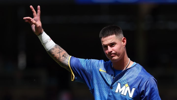 Jul 6, 2024; Minneapolis, Minnesota, USA; Minnesota Twins third baseman Jose Miranda (64) acknowledges the crowd after his streak of 12 consecutive at-bats with a hit comes to an end during the sixth inning against the Houston Astros at Target Field. Mandatory Credit: Matt Krohn-USA TODAY Sports