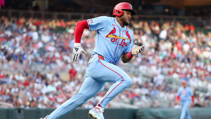 Aug 24, 2024; Minneapolis, Minnesota, USA; St. Louis Cardinals center fielder Victor Scott II (11) runs the bases after hitting a double against the Minnesota Twins during the third inning at Target Field. Mandatory Credit: Matt Krohn-USA TODAY Sports