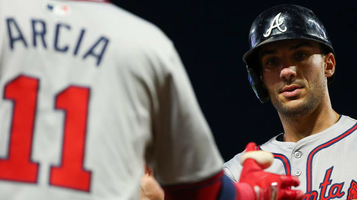 Aug 28, 2024; Minneapolis, Minnesota, USA; Atlanta Braves first baseman Matt Olson (28) celebrates after scoring on a double hit by left fielder Ramon Laureano (18) during the seventh inning against the Minnesota Twins at Target Field. Mandatory Credit: Matt Krohn-USA TODAY Sports