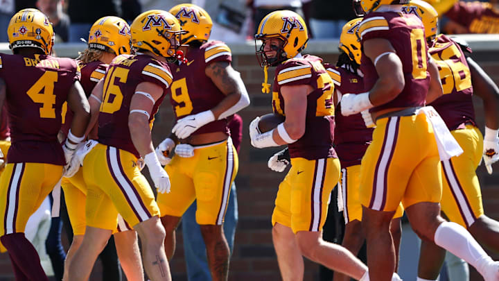 Sep 7, 2024; Minneapolis, Minnesota, USA; Minnesota Golden Gophers defensive back Jack Henderson (20) celebrates his touchdown.