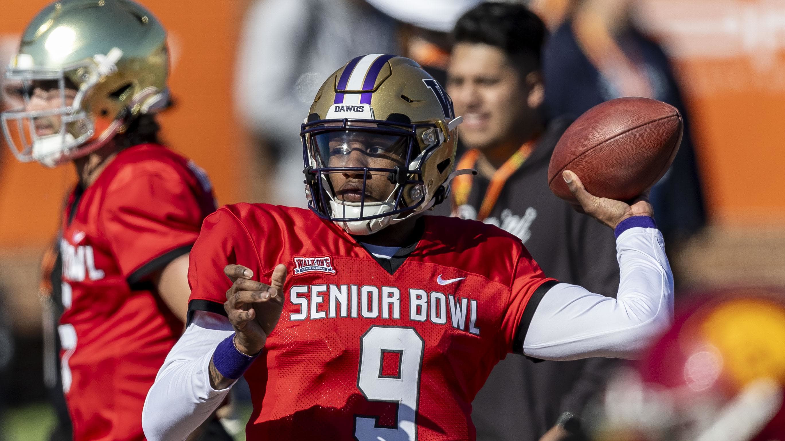 National quarterback Michael Penix Jr. of Washington (9) throws the ball at the Senior Bowl.
