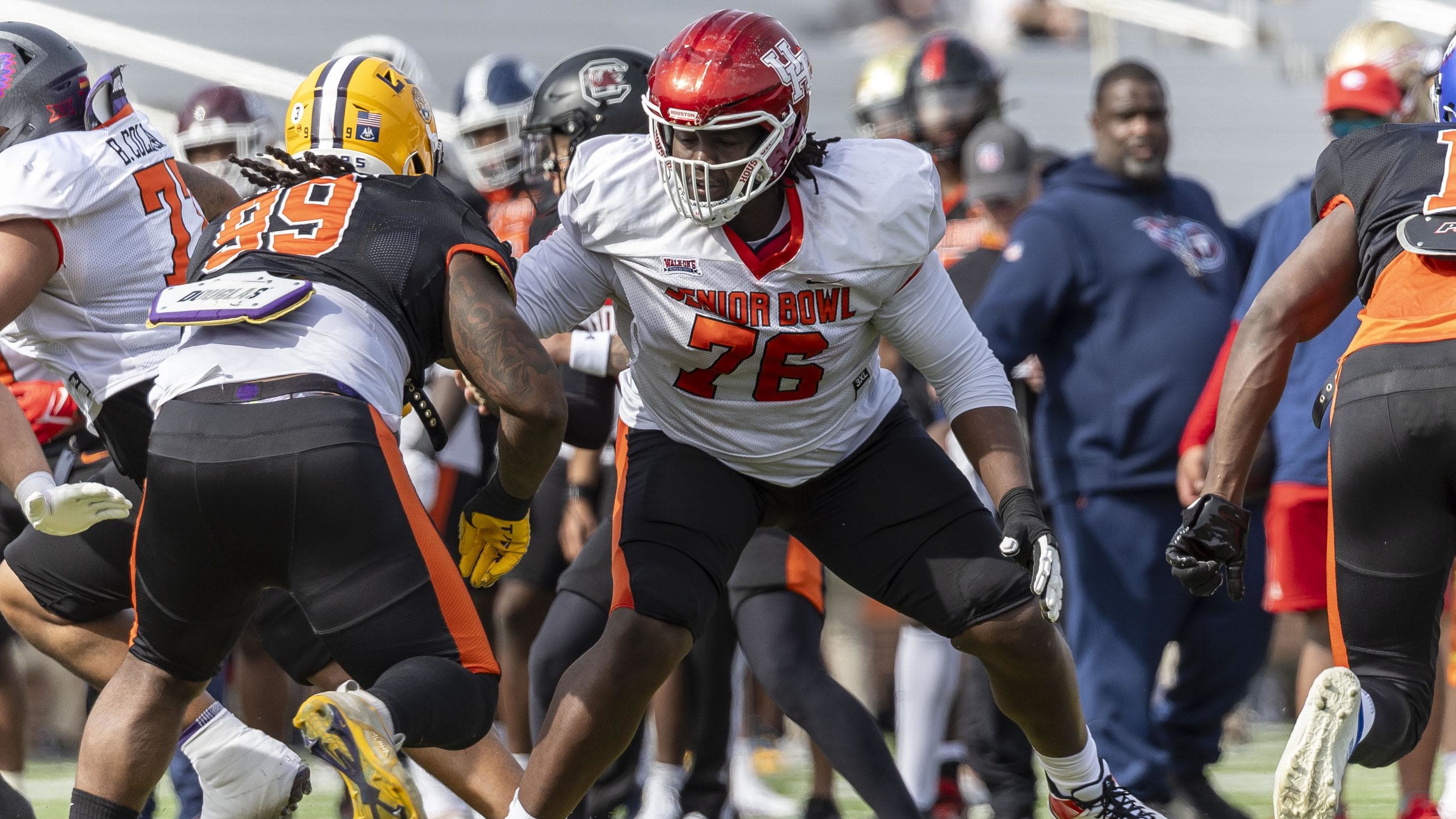 Houston offensive lineman Patrick Paul of Houston (76) faces off with an edge rusher at the Senior Bowl.