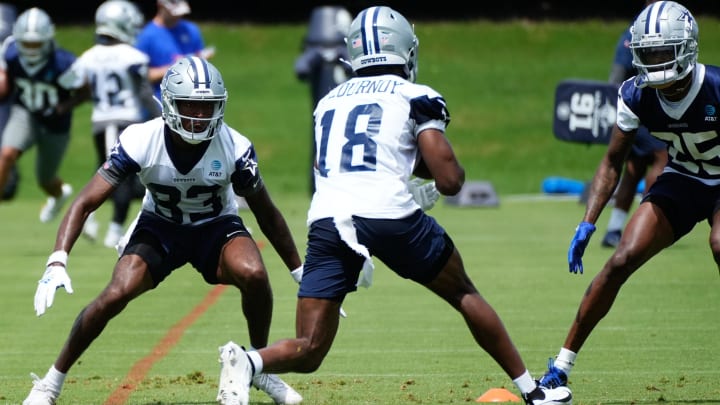 Jun 5, 2024; Frisco, TX, USA;  Dallas Cowboys wide receiver Ryan Flournoy (18) goes through a drill during practice at the Ford Center at the Star Training Facility in Frisco, Texas. 
